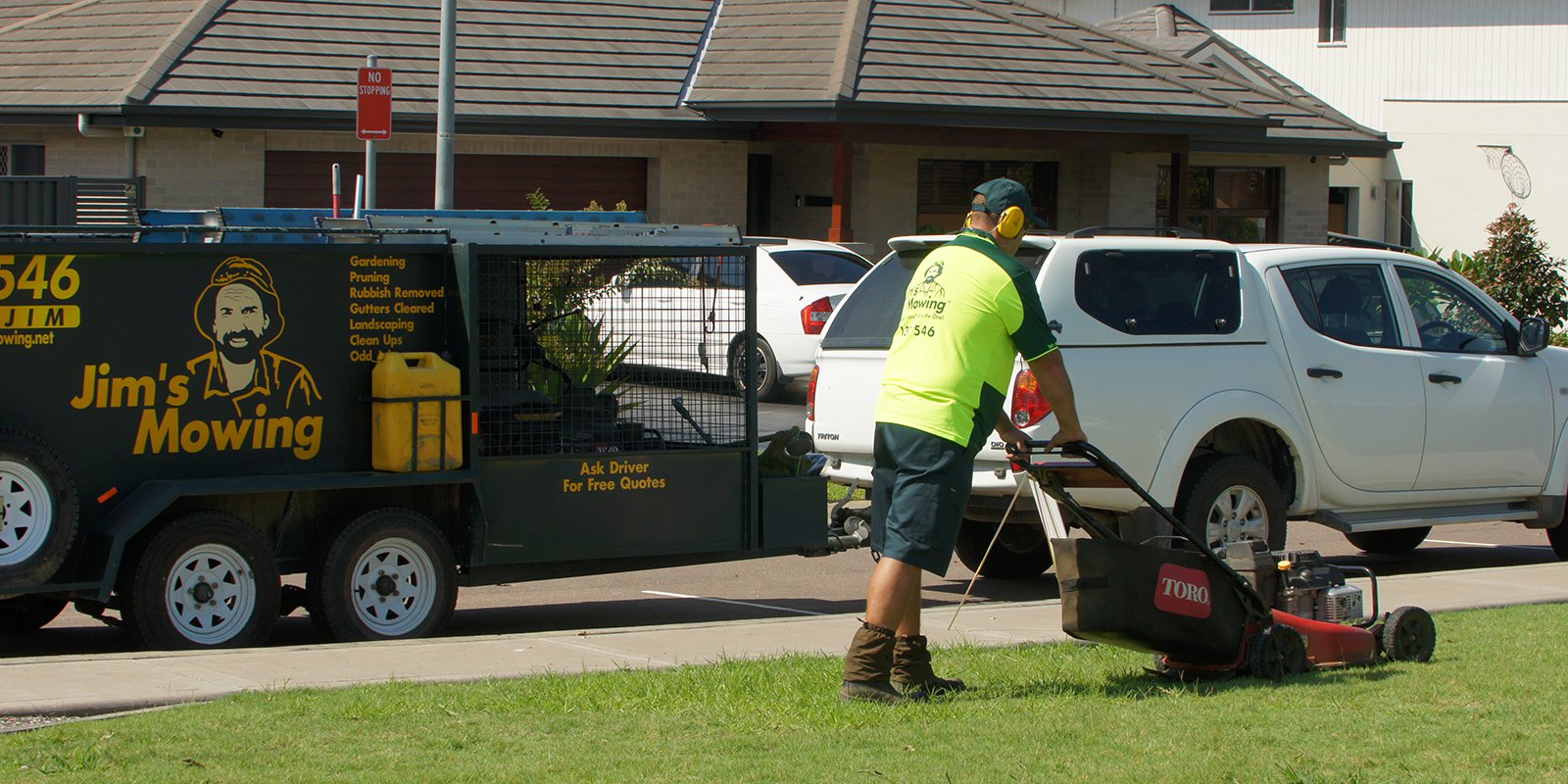 A Jim's Mowing franchisee mowing a lawn