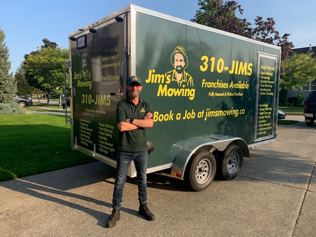 George Missel our Jim’s Mowing franchisee in Langley in front of his trailer