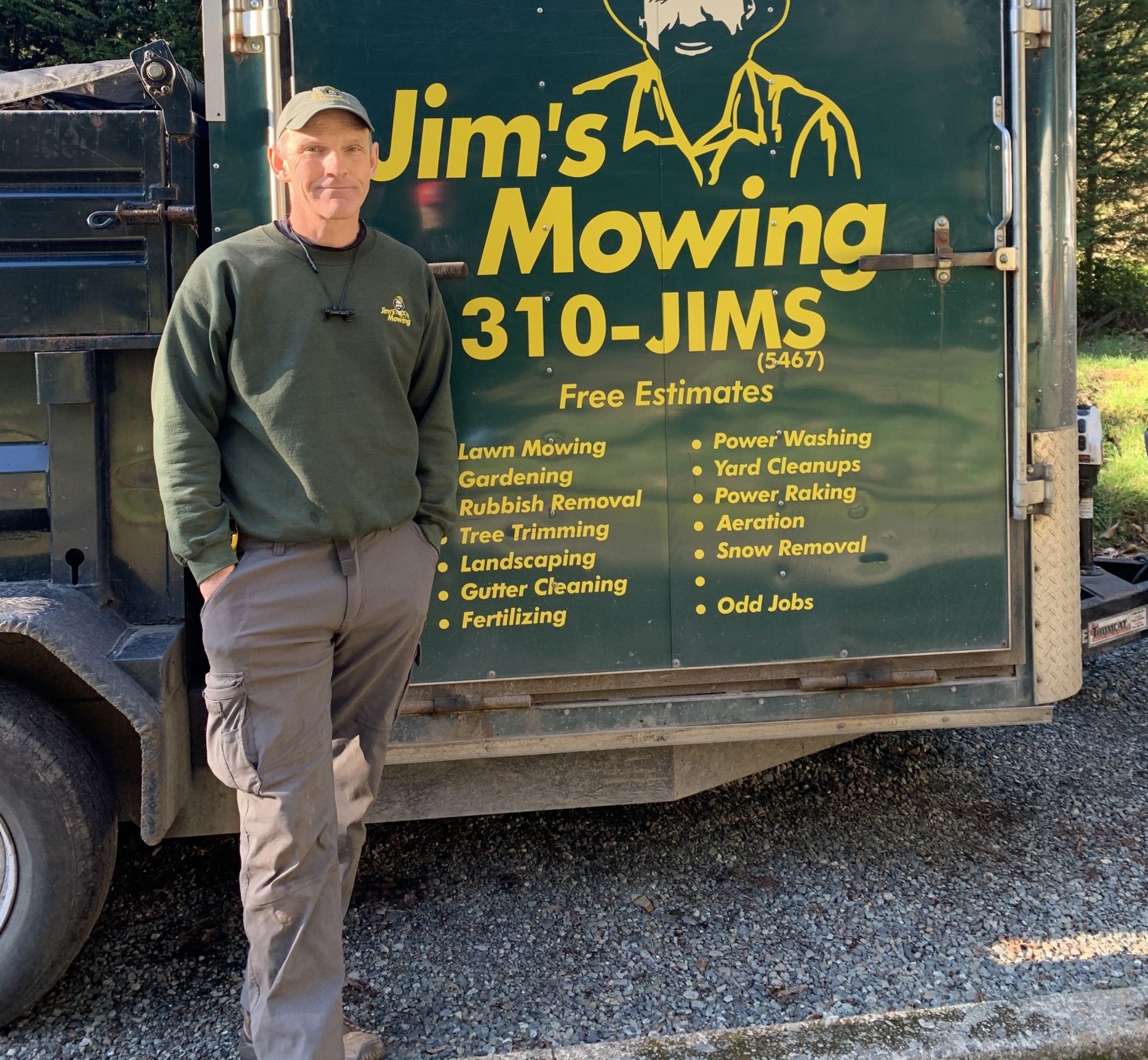 Joel Pendergast our Jim’s Mowing franchisee in Victoria in front of trailer