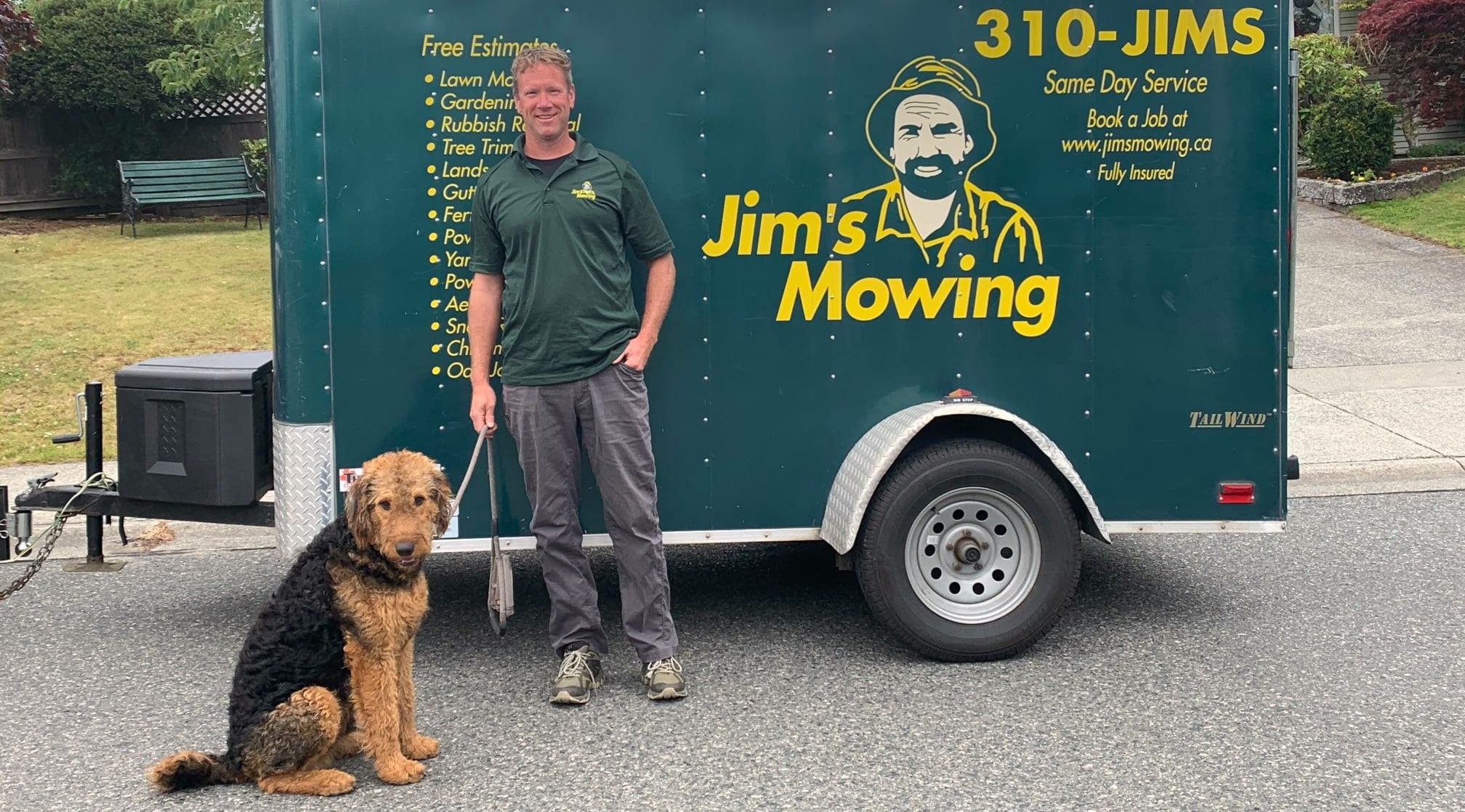 Michael Linder our Jim’s Mowing franchisee in Nanaimo in front of trailer