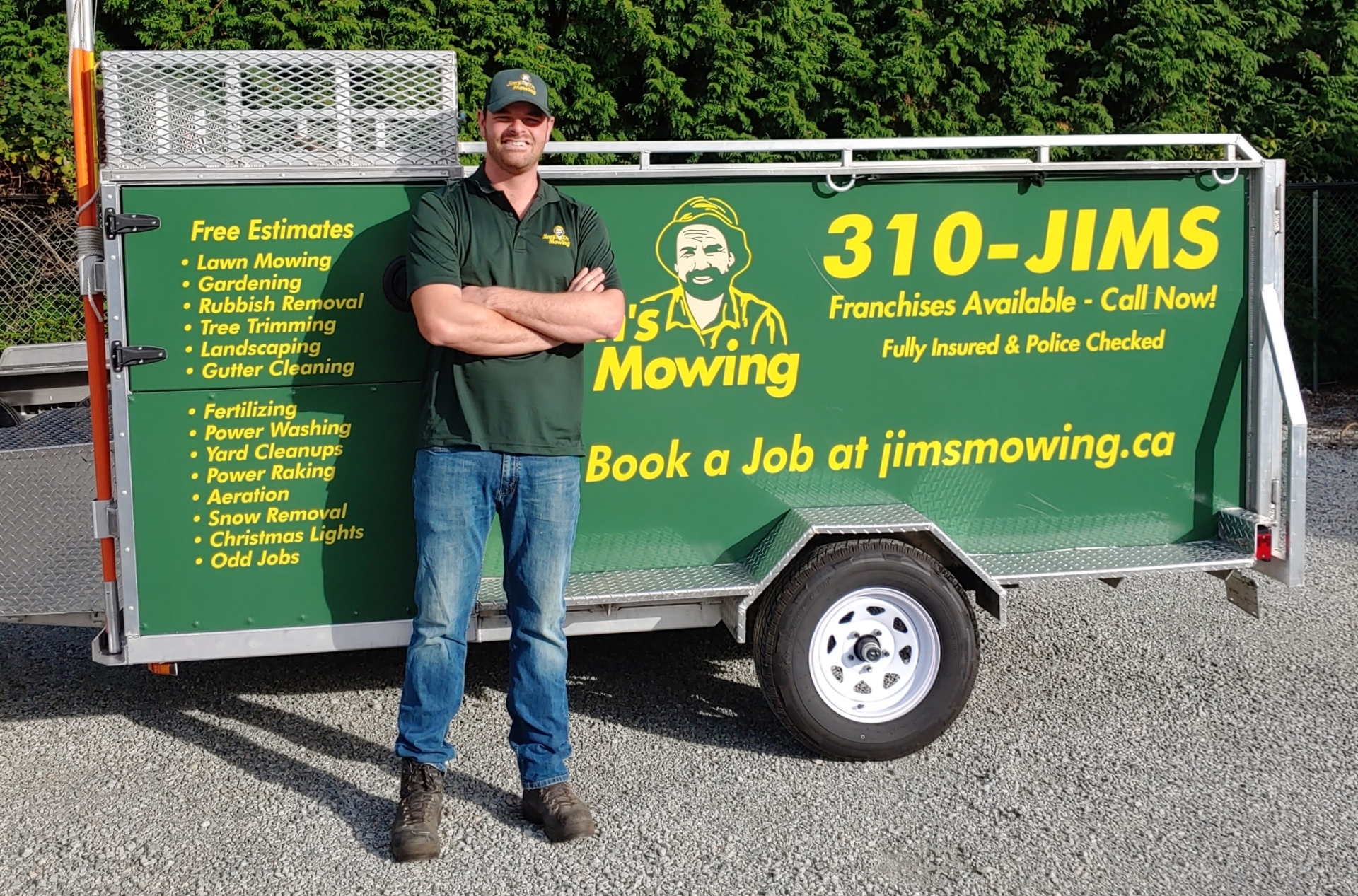 Rio & Breanne Kemle our Jim’s Mowing franchisee in Abbotsford in front of trailer