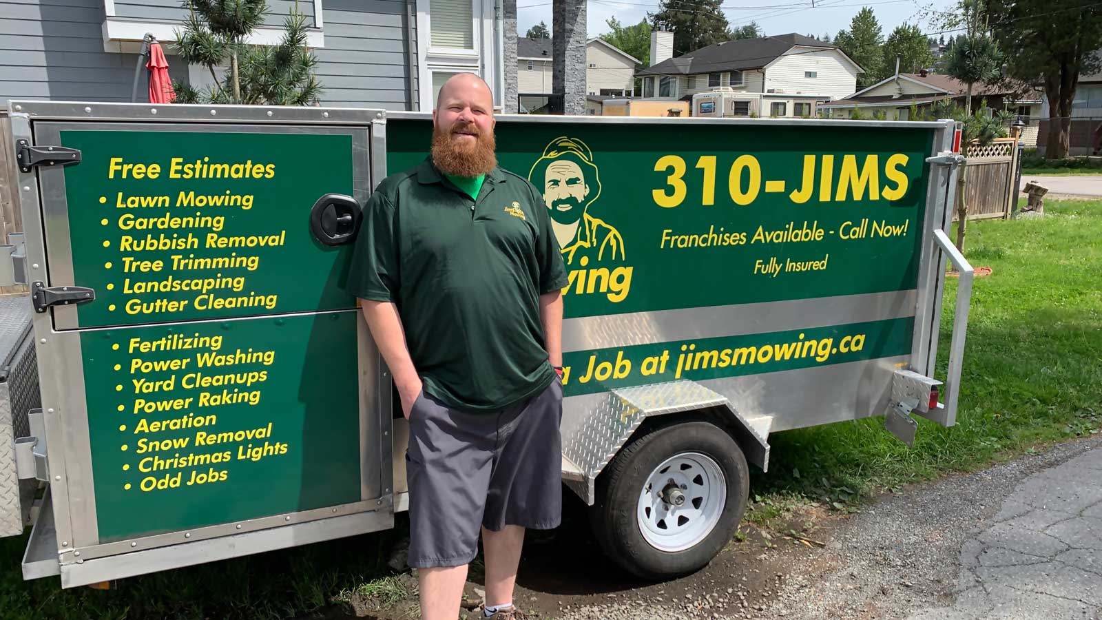 Chris Thomsen our Jim’s Mowing franchisee in Abbotsford in front of trailer