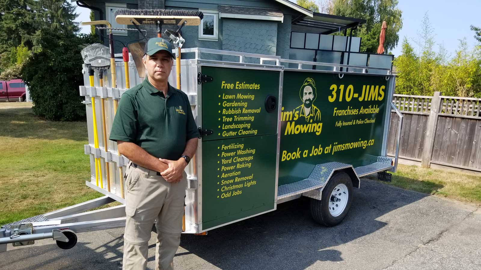 Antonio Hurtado-Coll our Jim’s Mowing franchisee in North Delta and Surrey in front of trailer