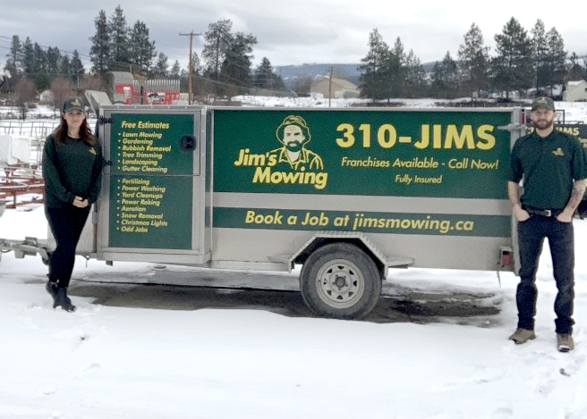 Jeff Jeff Skuggedal our Jim’s Mowing franchisee in Kelowna in front of trailer 2