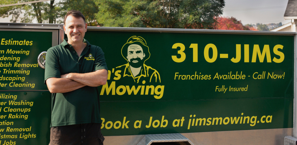 Gilles Tanguay our Jim’s Mowing franchisee in Vancouver and Burnaby in front of trailer