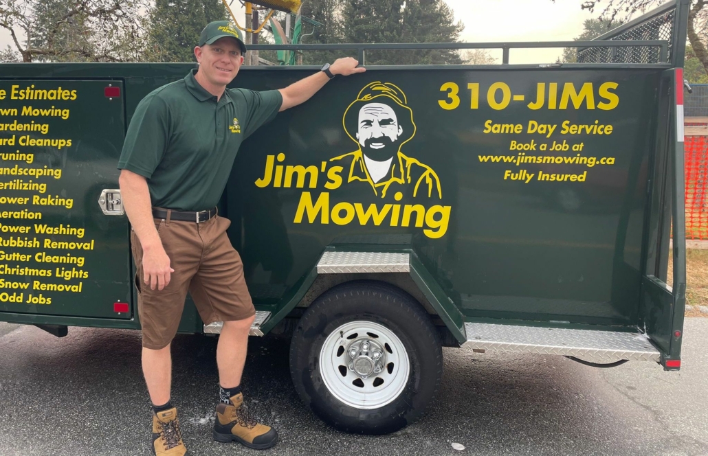 Aaron Miller our Jim’s Mowing franchisee in Abbotsford and Mission in front of trailer