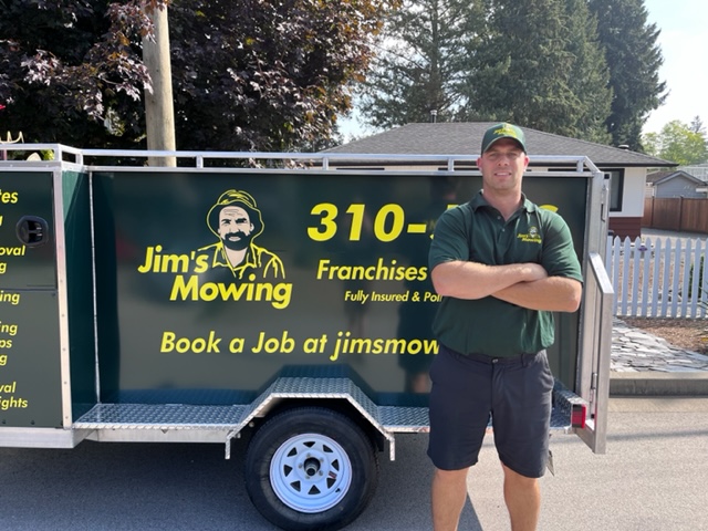 Craig Martin our Jim’s Mowing franchisee in Saltair, Ladysmith, Cinnibar, and South Nanaimo in front of trailer