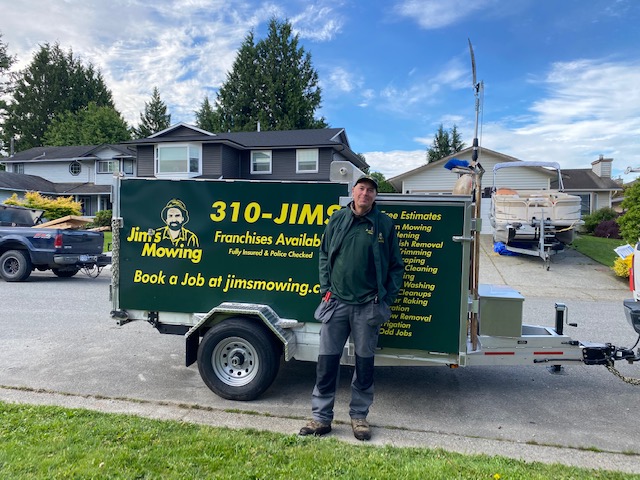 Garry Elgear our Jim’s Mowing franchisee in Maple Ridge in front of trailer