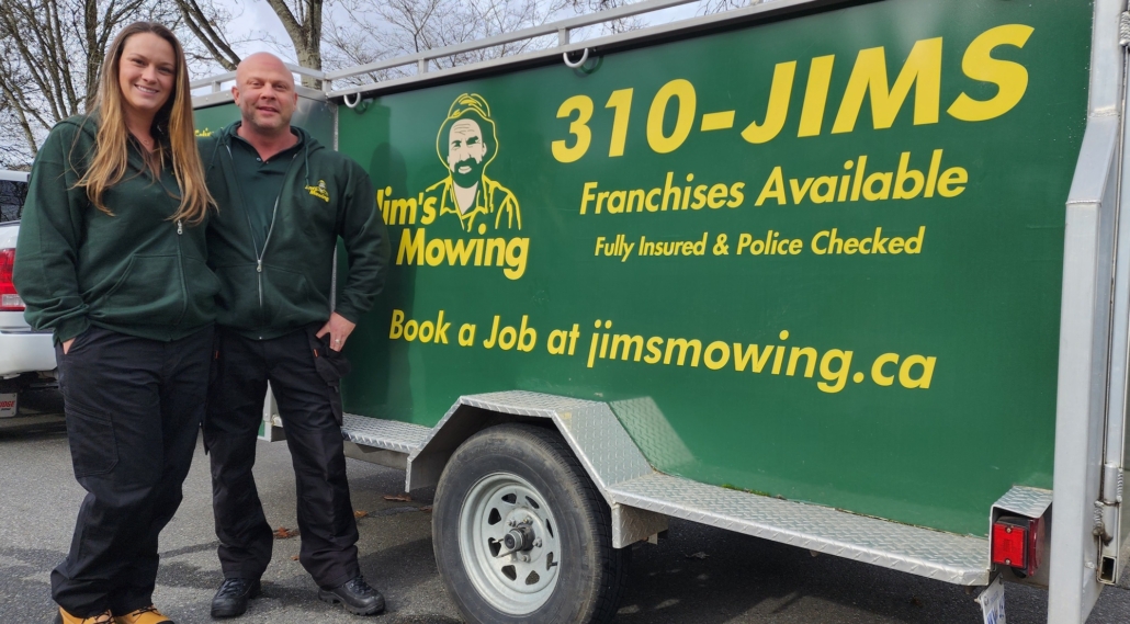 Adam Turner our Jim’s Mowing franchisee inLangley in front of trailer