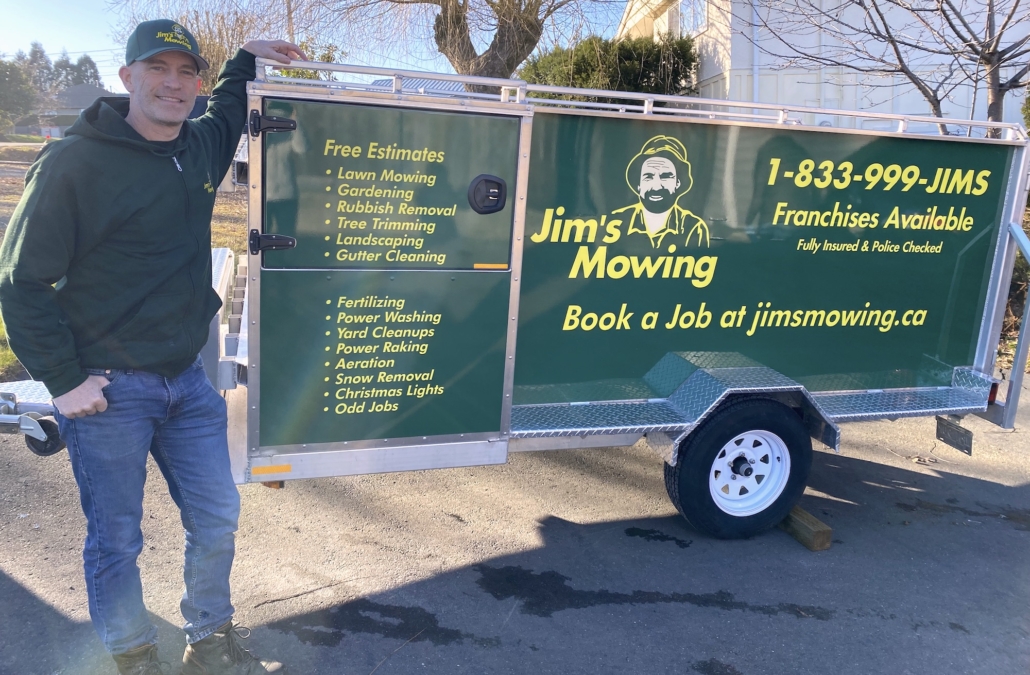 Shawn Edwards our Jim’s Mowing franchisee in Campbell River in front of trailer