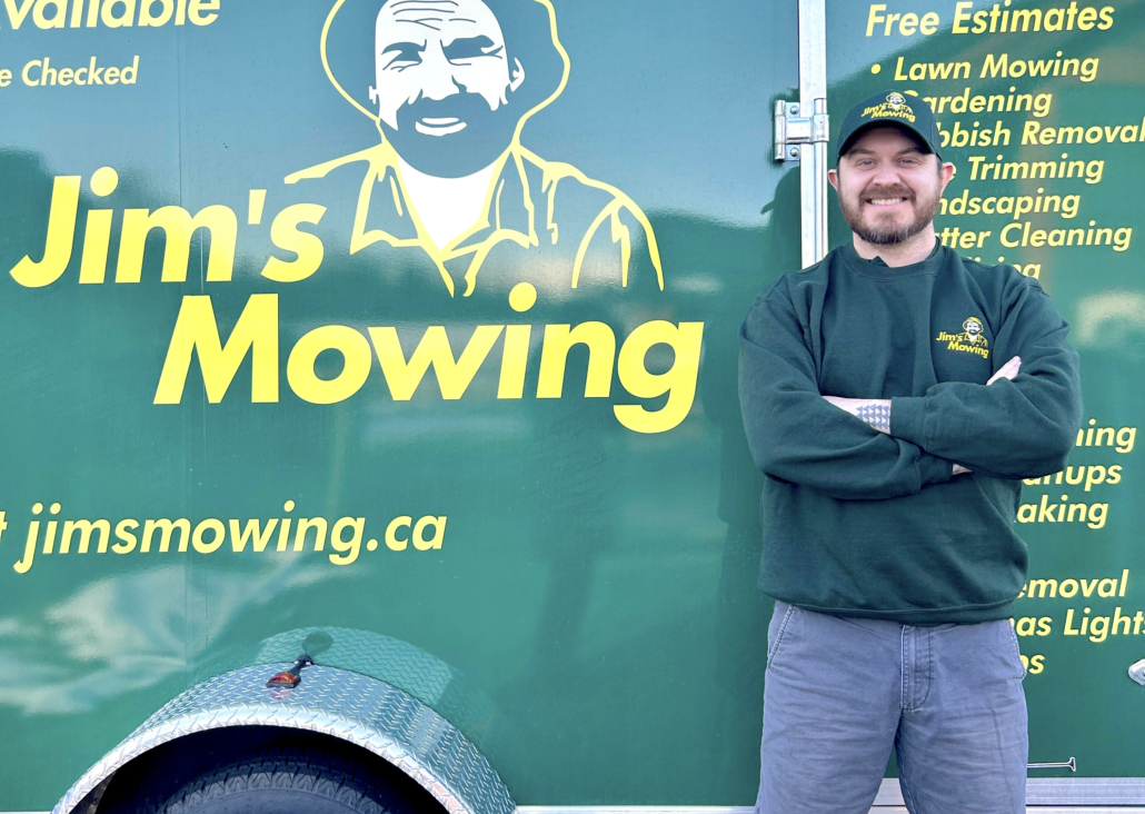 Jon Wall our Jim’s Mowing franchisee in Nanaimo in front of trailer