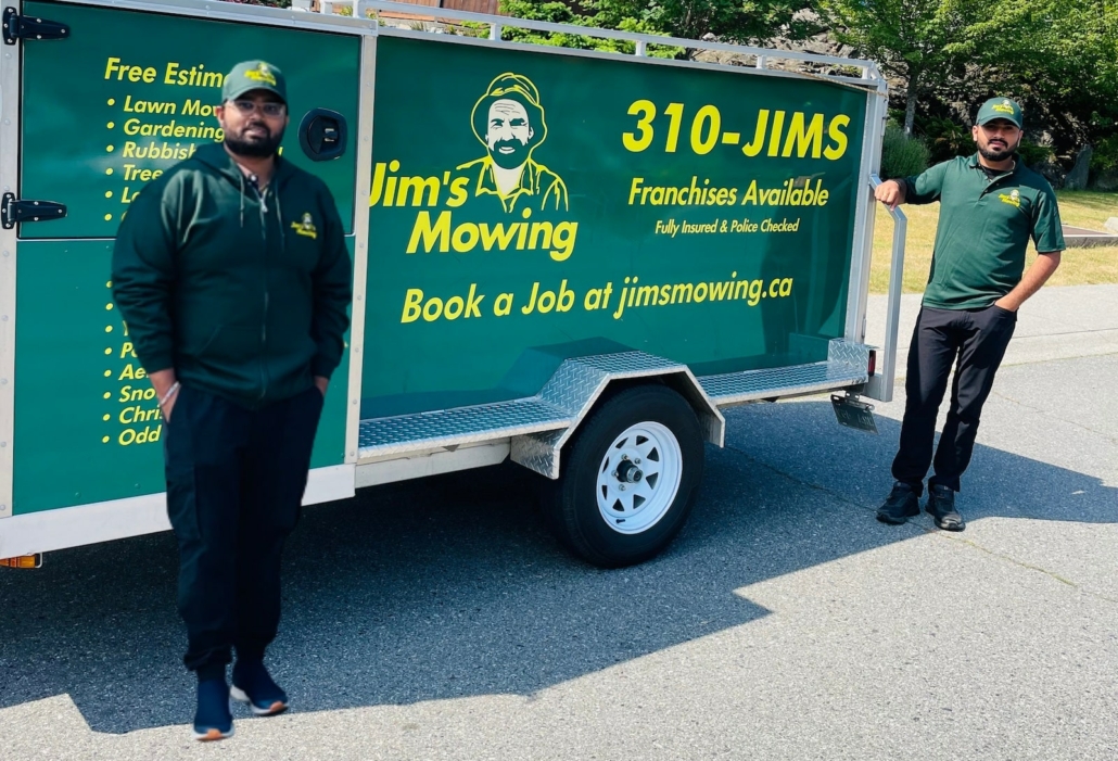 Bharat Bharat and Rajeev Penke our Jim’s Mowing franchisee in Nanaimo in front of trailer