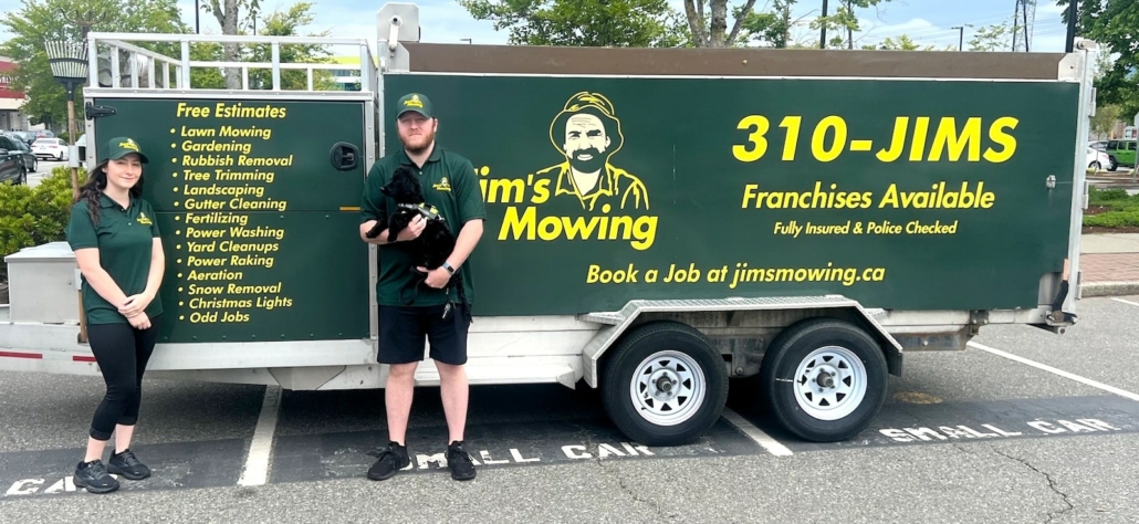 Jadon Balla our Jim’s Mowing franchisee in Mission in front of trailer