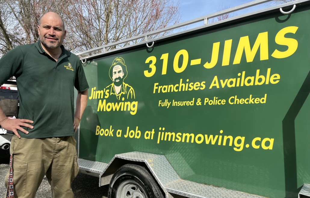 Jason Marcano our Jim’s Mowing franchisee in Kamloops in front of trailer