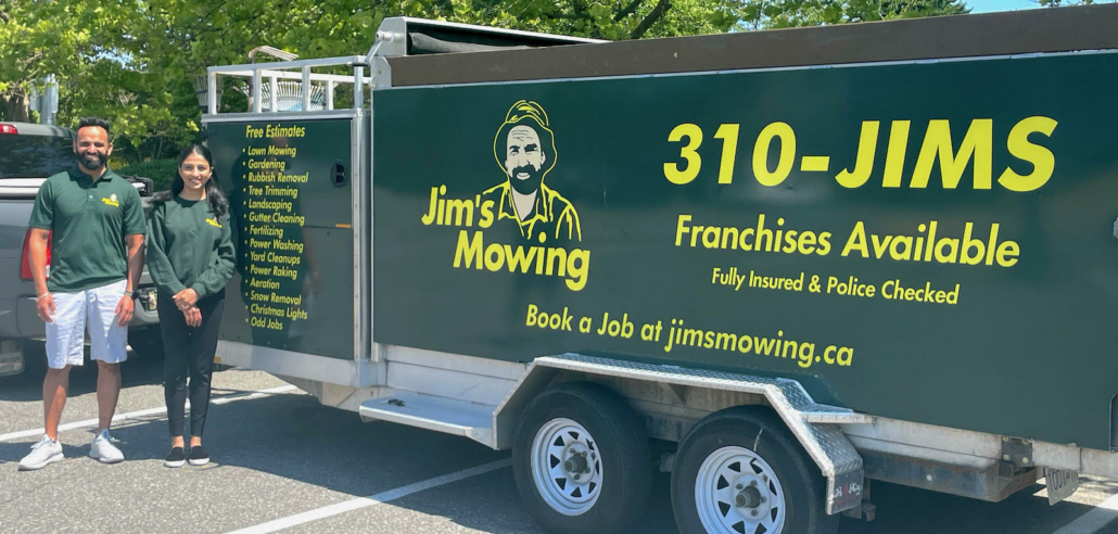 Mandeep and Gurjit Johal our Jim’s Mowing franchisee in Surrey in front of trailer