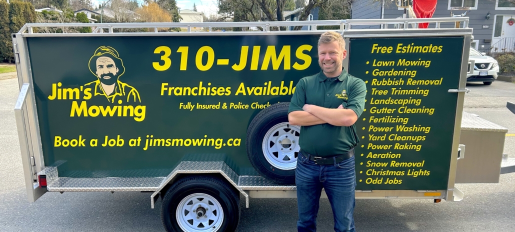 Richard Cramer our Jim’s Mowing franchisee in Abbotsford and Chilliwack in front of trailer