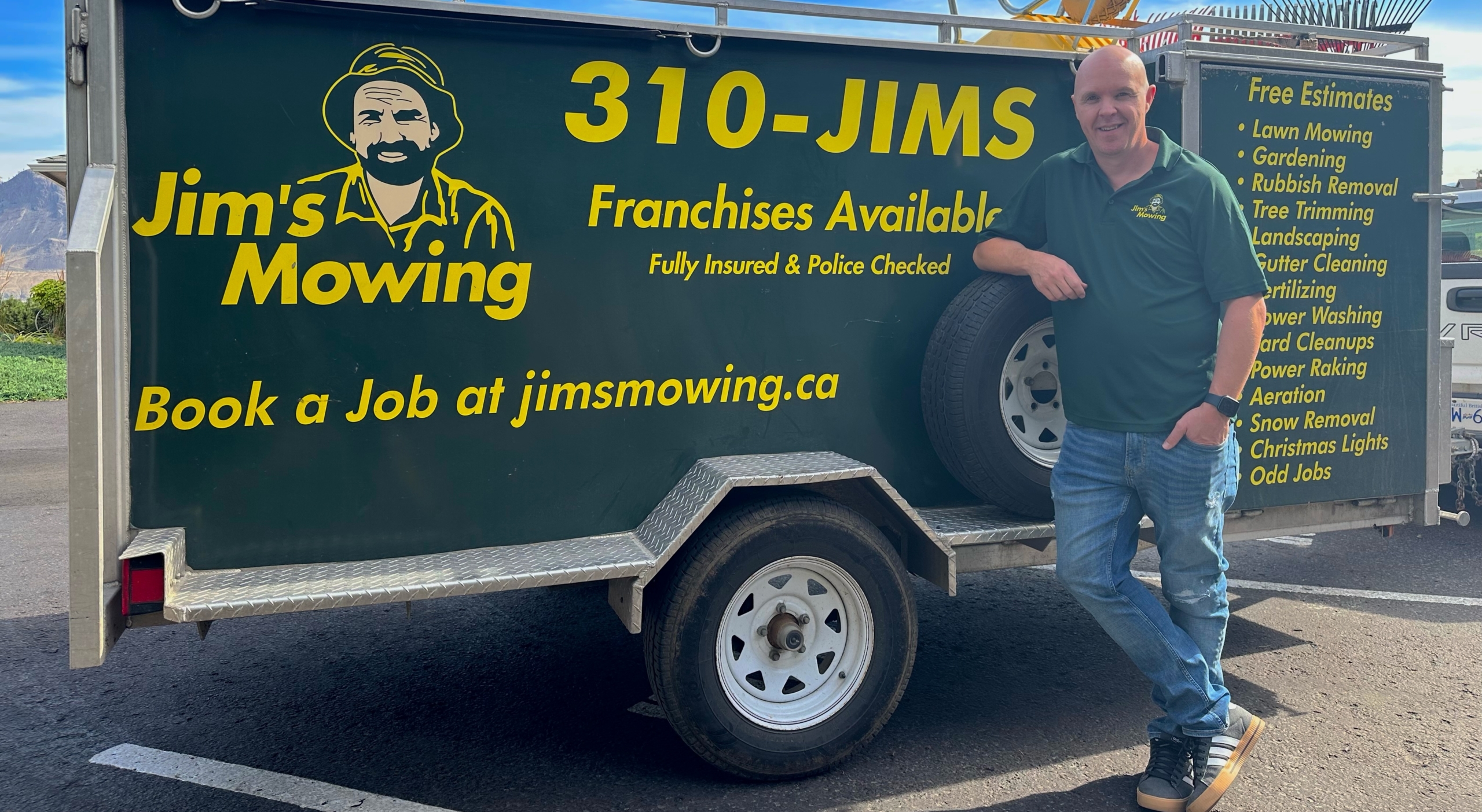 Sean Seller our Jim’s Mowing franchisee in Kamloops in front of trailer