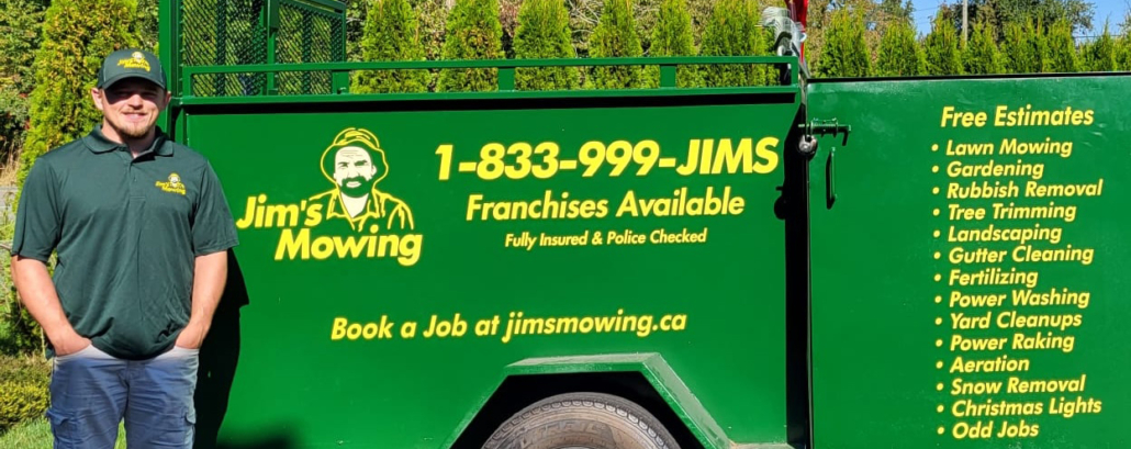 William Sitter our Jim’s Mowing franchisee in Langley in front of trailer